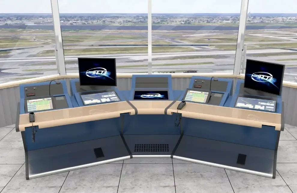 Rendering of air traffic control consoles in a tower cab overlooking an airfield